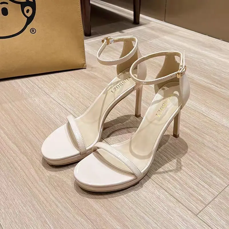 Es y sexys sandalias de tacón alto 2025, nuevas para verano, con punta abierta, de una sola tira, de alta elevación, e...