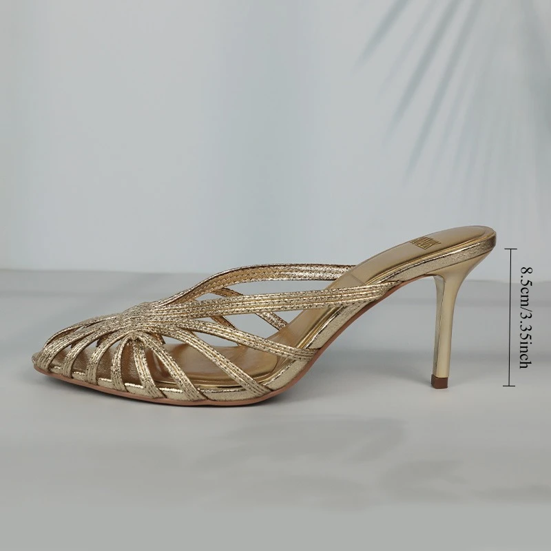 Nuevos tacones de tira fina huecos dorados para mujer, zapatos de tacón con punta estrecha de lujo, zapatos de tacón de aguja para oficina para mujer, sandalias de verano 2025