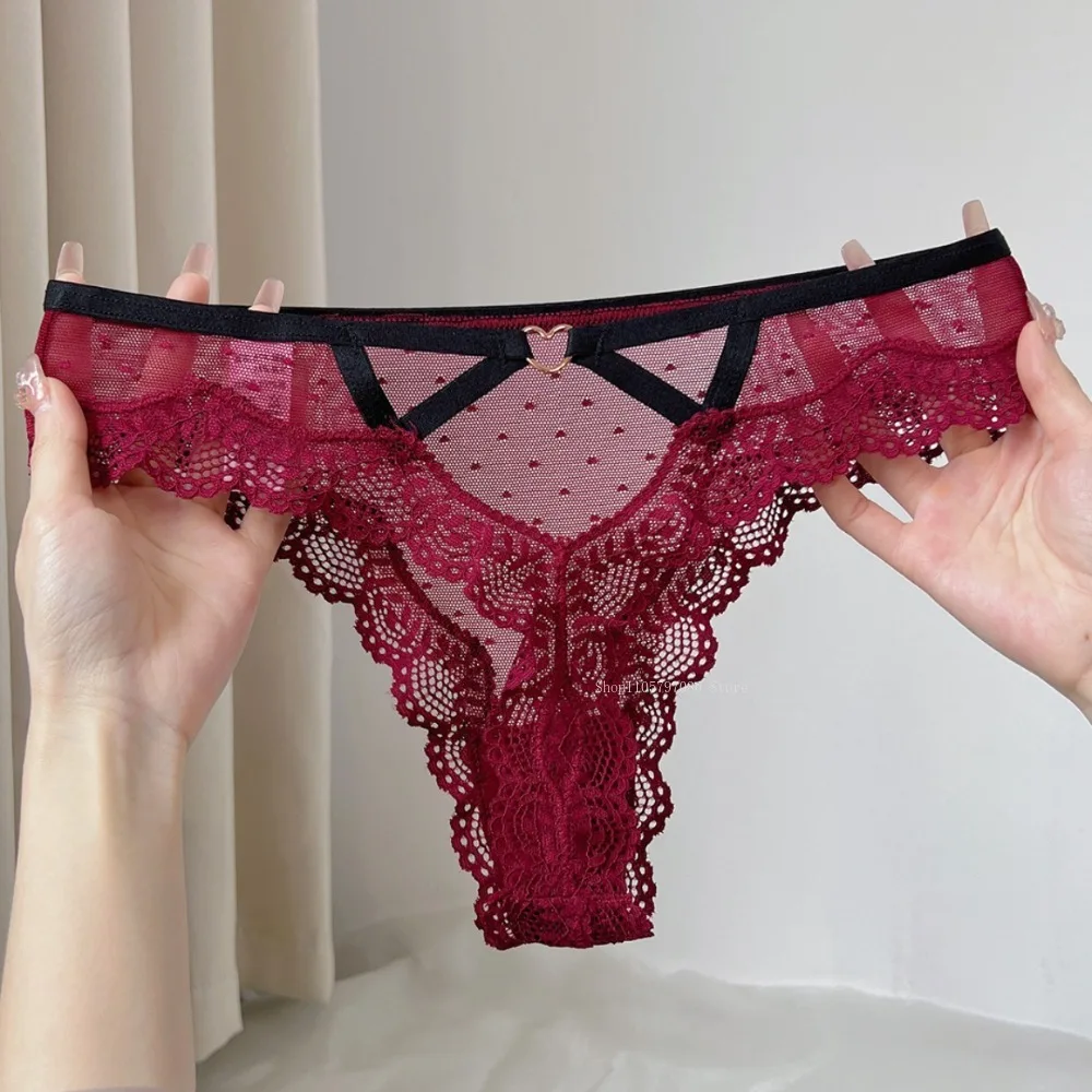 Tanga sexy de encaje de malla con lunares para mujer, bragas transparentes de encaje hueco, sin costuras, de cintura baja, con entrepierna de algodón, bragas triangulares tipo T-Back.