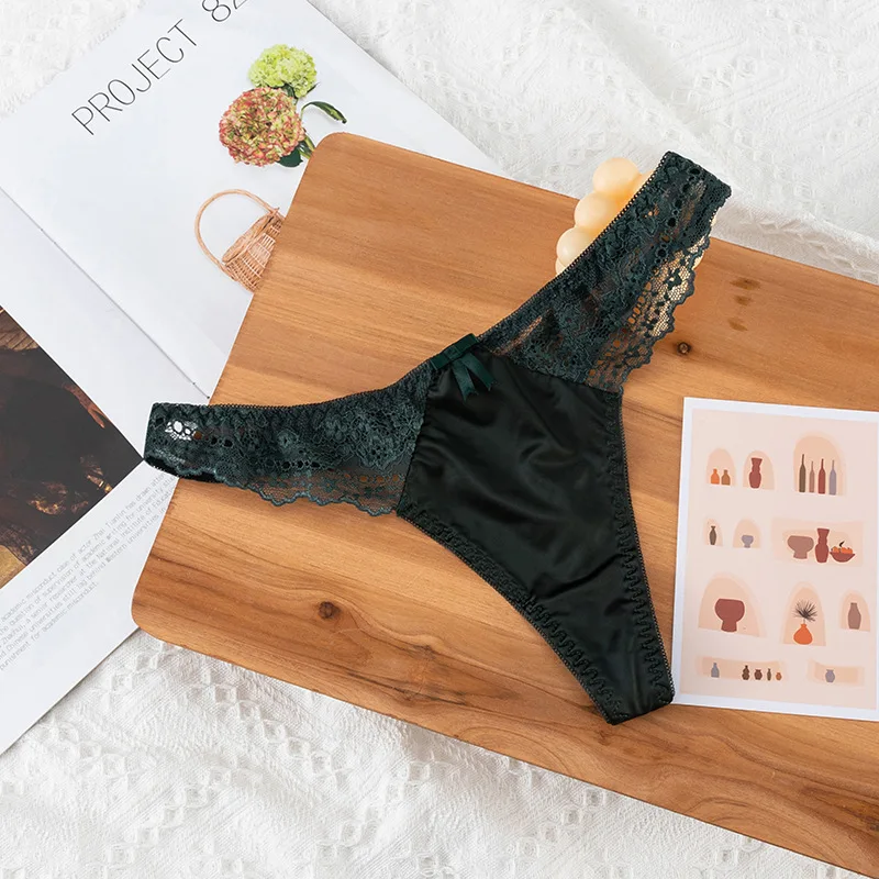 Tanga de encaje calado, sexy, de satén brillante y sedoso, para mujer, con cintura baja, estilo G-string, con lazo, sin costuras, lencería, bikini.