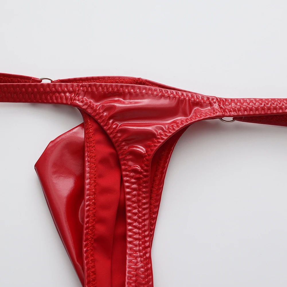Tangas de cuero sintético brillante y atractivas para hombre, con diseño de refuerzo en la parte delantera, corte en forma de T, cintura baja, ropa interior erótica, calzoncillos de estilo «sissy».