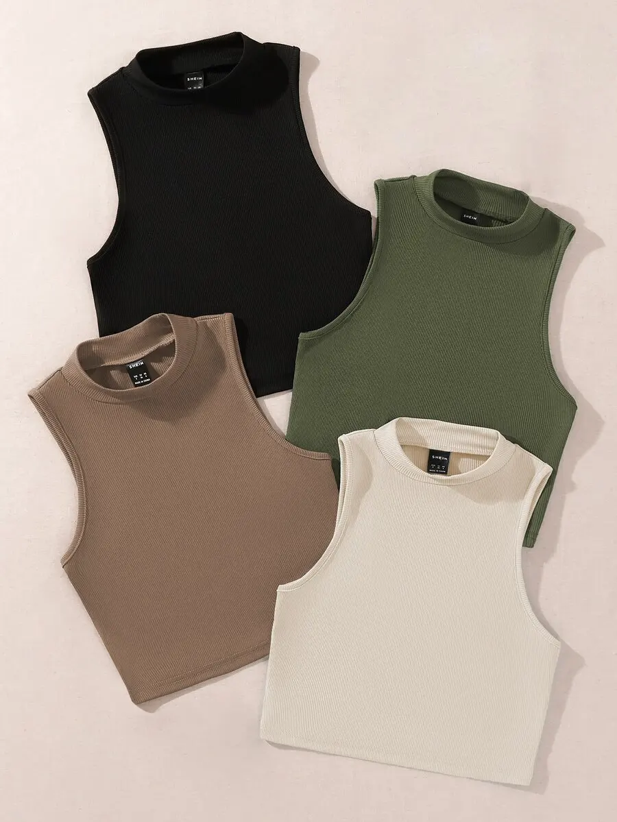 Camiseta sin mangas de corte corto con cuello alto y diseño acanalado para mujer. Camiseta sin mangas de corte corto con cuello alto y diseño acanalado para mujer.
