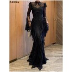 Vestido de noche formal para mujer Sansa personalizado en color blanco marfil, con cuello alto, mangas acampanadas de encaje transparente, flecos escalonados y encaje, estilo sirena, largo maxi. - Imagen 2