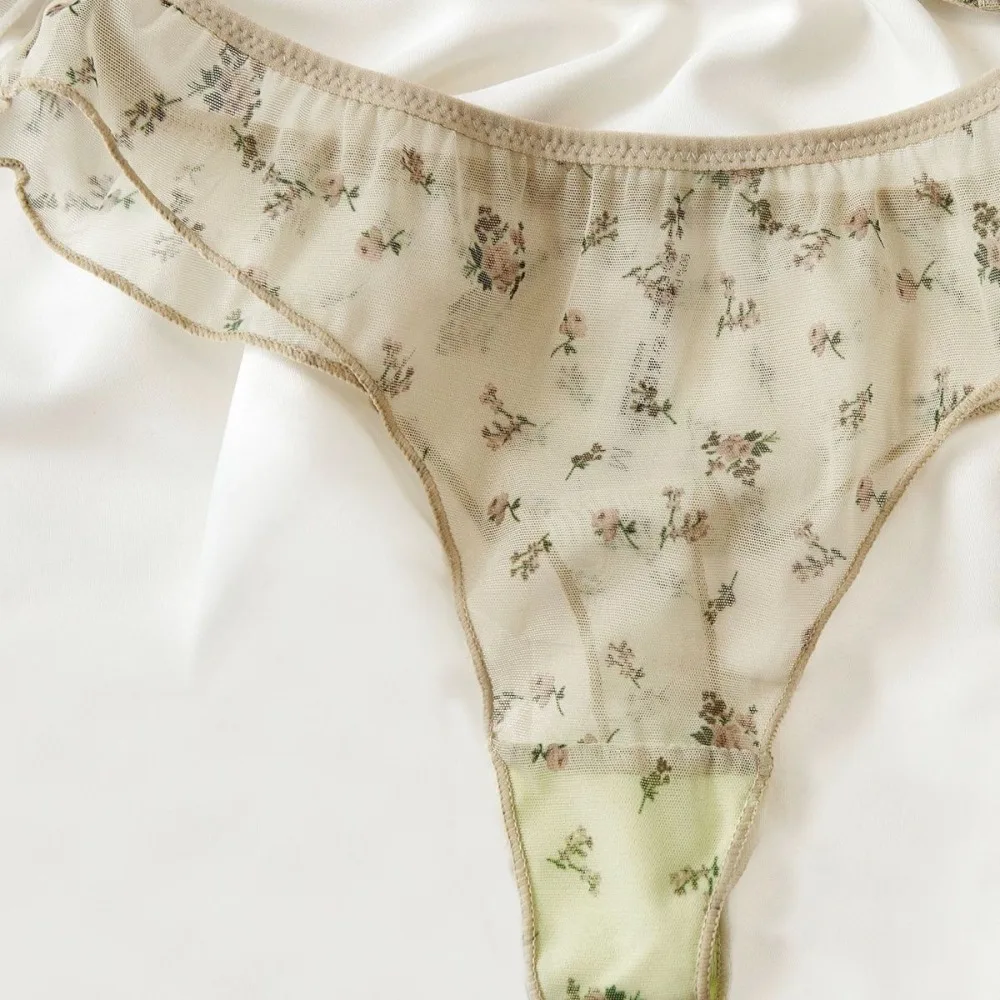 Conjunto de lencería ultrafina francesa, sujetador Sexy de encaje con estampado Floral, ropa interior de moda para mujer, conjuntos de sujetadores e Tanga íntimos transpirables de malla Conjunto de lencería ultrafina francesa, sujetador Sexy de encaje con estampado Floral, ropa interior de moda para mujer, conjuntos de sujetadores e Tanga íntimos transpirables de malla