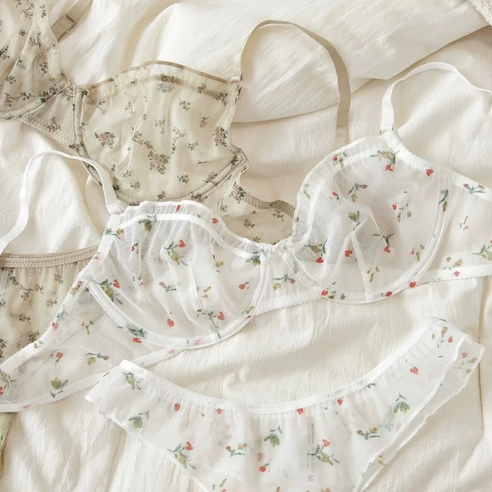 Conjunto de lencería ultrafina francesa, sujetador Sexy de encaje con estampado Floral, ropa interior de moda para mujer, conjuntos de sujetadores e Tanga íntimos transpirables de malla Conjunto de lencería ultrafina francesa, sujetador Sexy de encaje con estampado Floral, ropa interior de moda para mujer, conjuntos de sujetadores e Tanga íntimos transpirables de malla